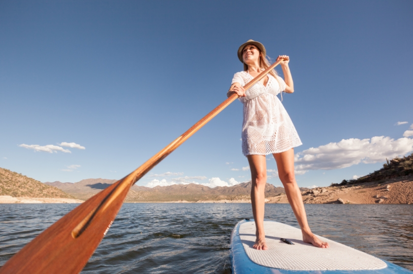 Young Woman Paddleboarding